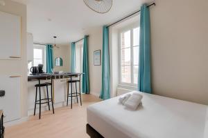 Appartements L-Islet - Joli studio a 2 pas de la mer : photos des chambres