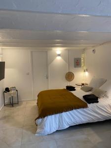 Appartements Le Cocon - proche gare avec jardinet - 2 adultes et 1 bebe : photos des chambres