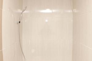 Minimalist and Cozy 3BR at Meikarta Apartment By Travelio