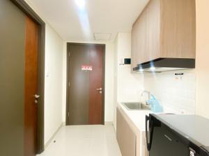 Cozy Studio Room at Pollux Chadstone Apartment By Travelio