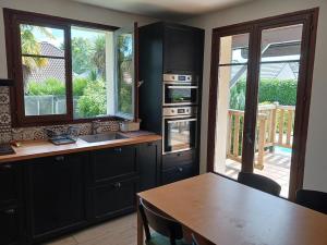 Maisons de vacances Maison familiale avec piscine : photos des chambres