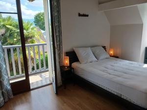 Maisons de vacances Maison familiale avec piscine : photos des chambres