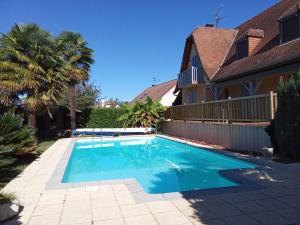Maisons de vacances Maison familiale avec piscine : photos des chambres