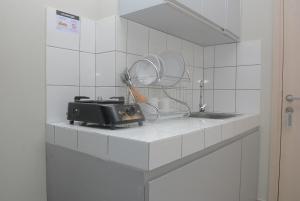 Elegant and Simply Studio Springlake Summarecon Apartment By Travelio