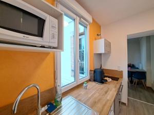 Appartements El Dorado - Proche du centre-ville : photos des chambres