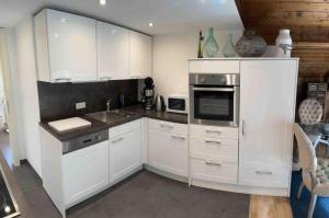 Haus Schmidhuber Ferienwohnung 4 mit Balkon und Bergblick