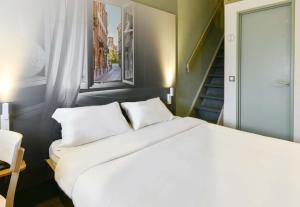 Hotels B&B HOTEL Toulouse Cite de l'Espace Mouchotte : photos des chambres