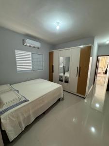 Casa em Itanhaém com Piscina e Ar condicionado à 900 Metros da Praia