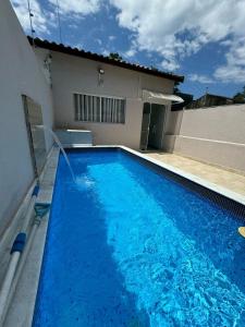 Casa em Itanhaém com Piscina e Ar condicionado à 900 Metros da Praia