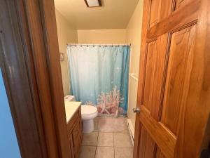 Lovely 26th street Bayside Garage Apt