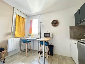 Appartements L'Emailleur studio cosy et tout equipe : photos des chambres