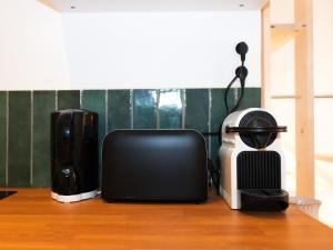 Appartements Logement renove proche de la gare RER TGV : photos des chambres