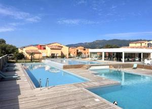 Appartements Corsica Bella 87 T2 Cosy piscines proche plage : photos des chambres