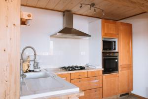 Appartements Gite Le p'tit Chasseral : photos des chambres