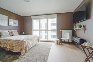 Appartements Proche Metro 5 et tram, parking, residence neuve : photos des chambres