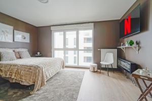 Appartements Proche Metro 5 et tram, parking, residence neuve : photos des chambres