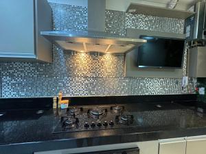 Elegância e Conforto na Tijuca 3 Quartos em Localização Premium