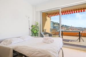Appartements 'L'Alicante proche' gare, terrasse, vue mer : photos des chambres