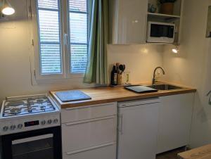 Maisons de vacances La petite enseigne - Chez Helene - Gites en baie : photos des chambres