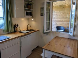 Maisons de vacances La petite enseigne - Chez Helene - Gites en baie : photos des chambres