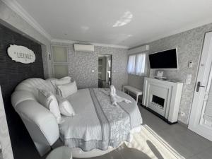 Appartements L-Etoile VIP AVEC JACUZZI : photos des chambres