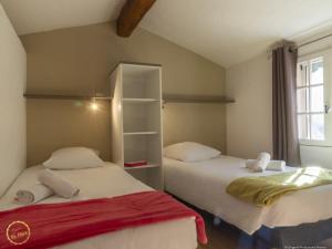 Villages vacances Les Garrigues de la Vallee des Baux : photos des chambres