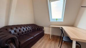 Hugos Nest moderne Ferienwohnung in Neumünster mit Arbeitsplatz & WLAN