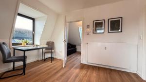Hugos Nest moderne Ferienwohnung in Neumünster mit Arbeitsplatz & WLAN