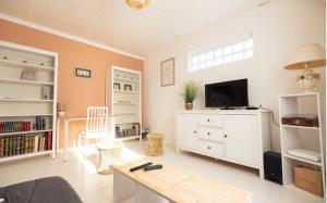 Appartements Charmante Maison de village Clim et Wifi : photos des chambres