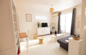Appartements Charmante Maison de village Clim et Wifi : photos des chambres