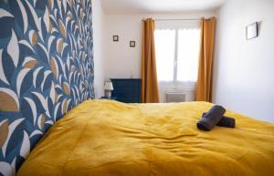 Appartements Charmante Maison de village Clim et Wifi : photos des chambres