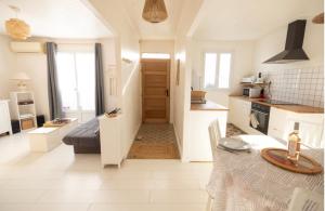 Appartements Charmante Maison de village Clim et Wifi : photos des chambres