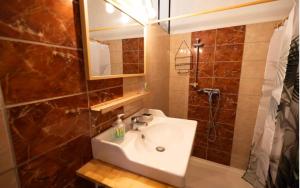Appartements Charmante Maison de village Clim et Wifi : photos des chambres