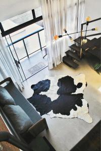 loft charmoso com lareira, a beira mar