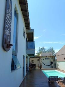 loft charmoso com lareira, a beira mar