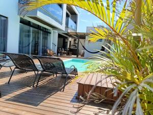 loft charmoso com lareira, a beira mar