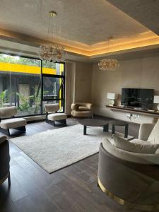 Luxury 2 Bedroom apartment with Sauna, steam, pool, gym and gaming room
