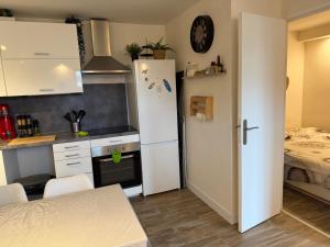 Appartements Dernier etage avec garage, piscines et tennis : photos des chambres