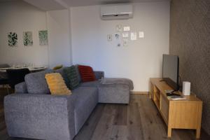 Le Verdoyant , maisonnette cosy avec terrasse totalement climatisé avec parking