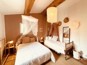 Sejours chez l'habitant Havre de paix et de charme avec piscine : photos des chambres