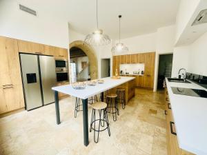 Maisons de vacances Les Rives du Parc Piscine 12 personnes : photos des chambres