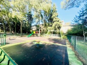 Maisons de vacances Les Rives du Parc Piscine 12 personnes : photos des chambres