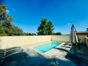 Maisons de vacances Les Rives du Parc Piscine 12 personnes : photos des chambres
