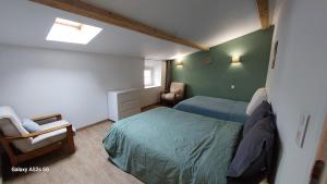Appartements Le duplex sigeannais : photos des chambres