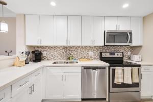 Modern Boca 2BR Retreat - Across From Beach with Pool & Balcony