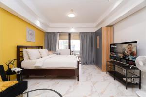 Greenbelt Makati Condo with Balcony & Park Views