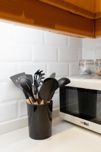 Charming Greenbelt Condo with Balcony & Pool Access