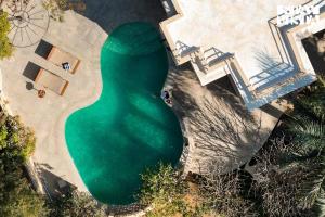 StayVista at Vanya Veda with Bathtub, Pool & Lawn