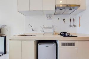 Fully Furnished with Cozy Studio Sky House BSD Apartment By Travelio