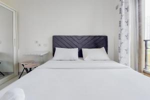 Fully Furnished with Cozy Studio Sky House BSD Apartment By Travelio